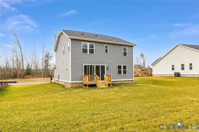 a front view of a house with a ocean view