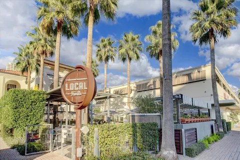 a view of a car parked in front of a building