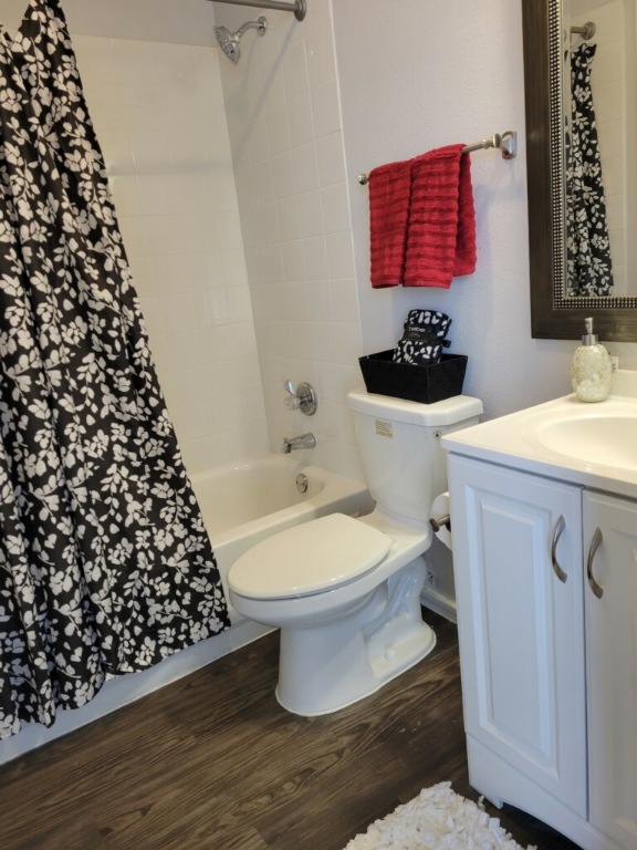 1740 Timber Ridge Road, Unit 132 Austin, TX 78741 - Photo 13 of 16 a bathroom with a toilet and a sink