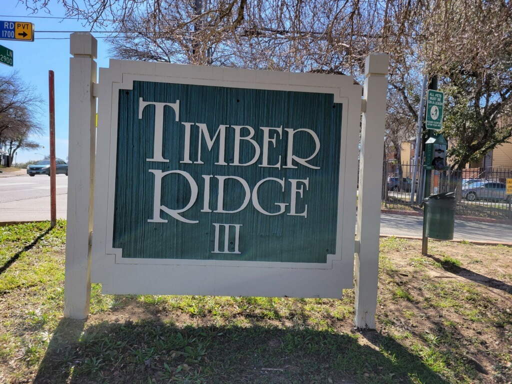 1740 Timber Ridge Road, Unit 132 Austin, TX 78741 - Photo 16 of 16 a view of a sign board