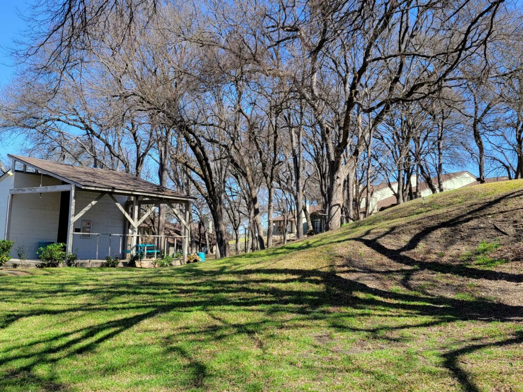 1740 Timber Ridge Road, Unit 132 Austin, TX 78741 - Photo 2 of 16 a view of a house with a yard