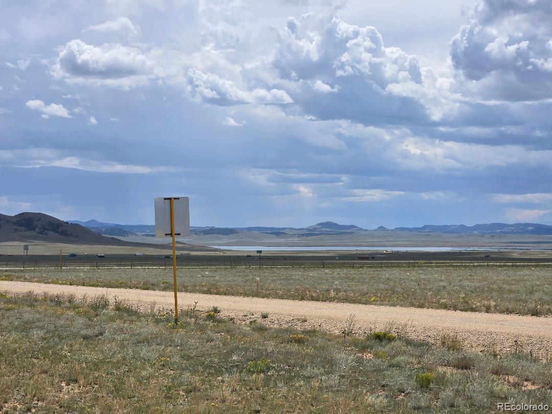 100 Imboden Road Lake George, CO 80827 - Photo 3 of 16 a view of a lake with a big yard