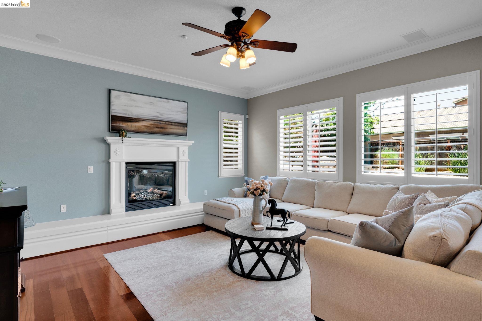 2513 Winged Foot Road Brentwood, CA 94513 - Photo 15 of 45 Living area featuring a white fireplace with an ornate mantel, a gas insert, and a hearth