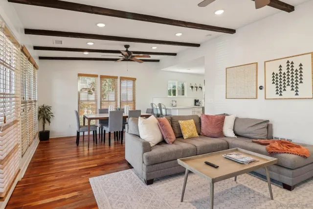 a bathroom with a shower sink and mirror