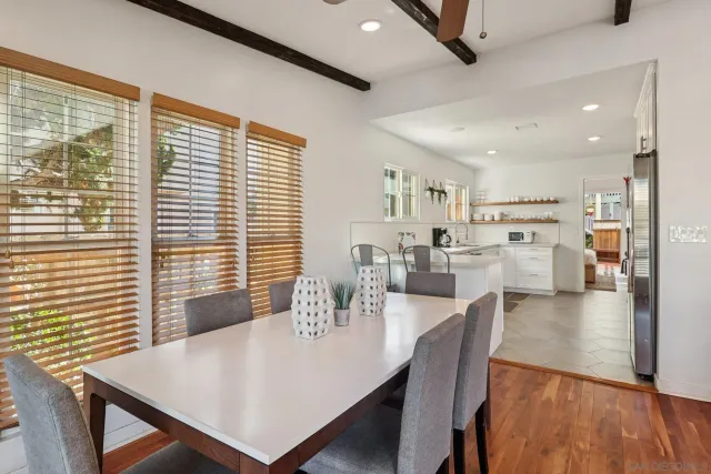 a kitchen with a sink cabinets and window