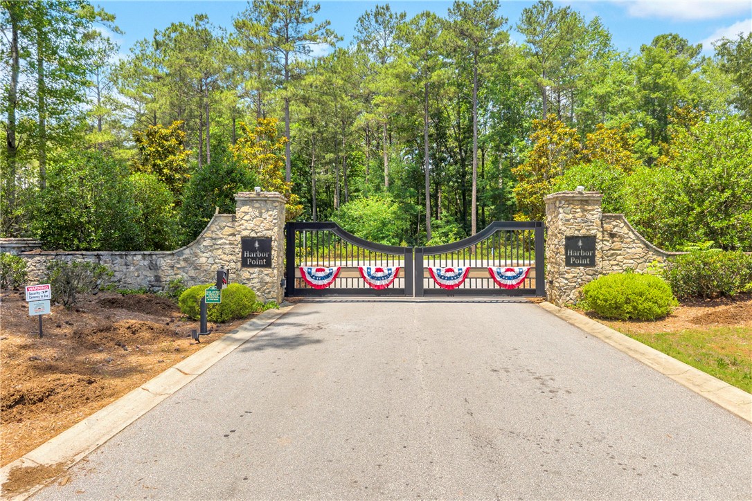 Lot 60 Harbor Point Seneca, SC 29672 - Photo 30 of 30 Secure gated entry welcomes you to Harbor Point, framed by mature trees and lush plantings.