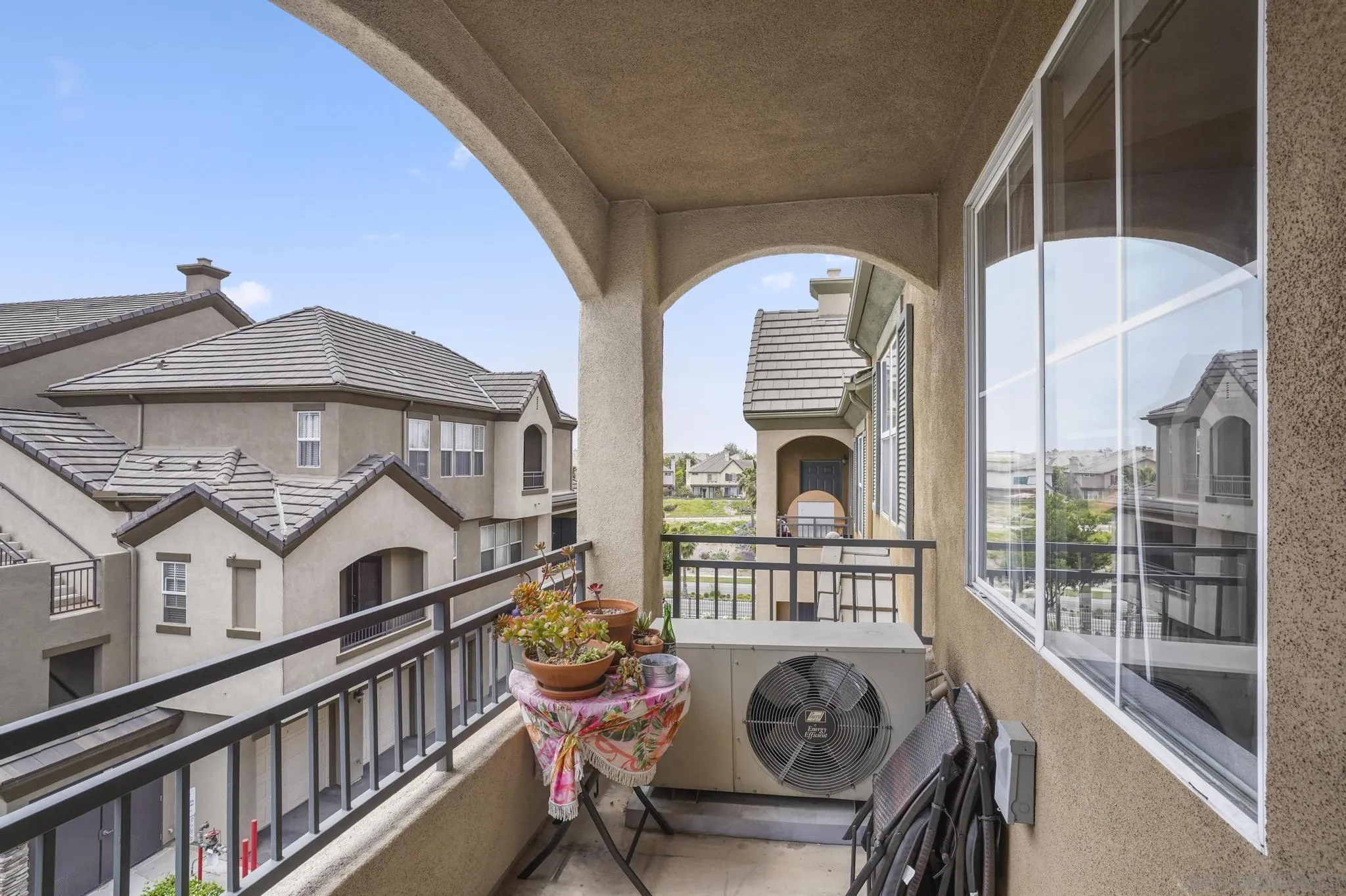 1853 Rue Bienville Place, Unit 833 Chula Vista, CA 91913 - Photo 5 of 23 a house view with a outdoor seating space