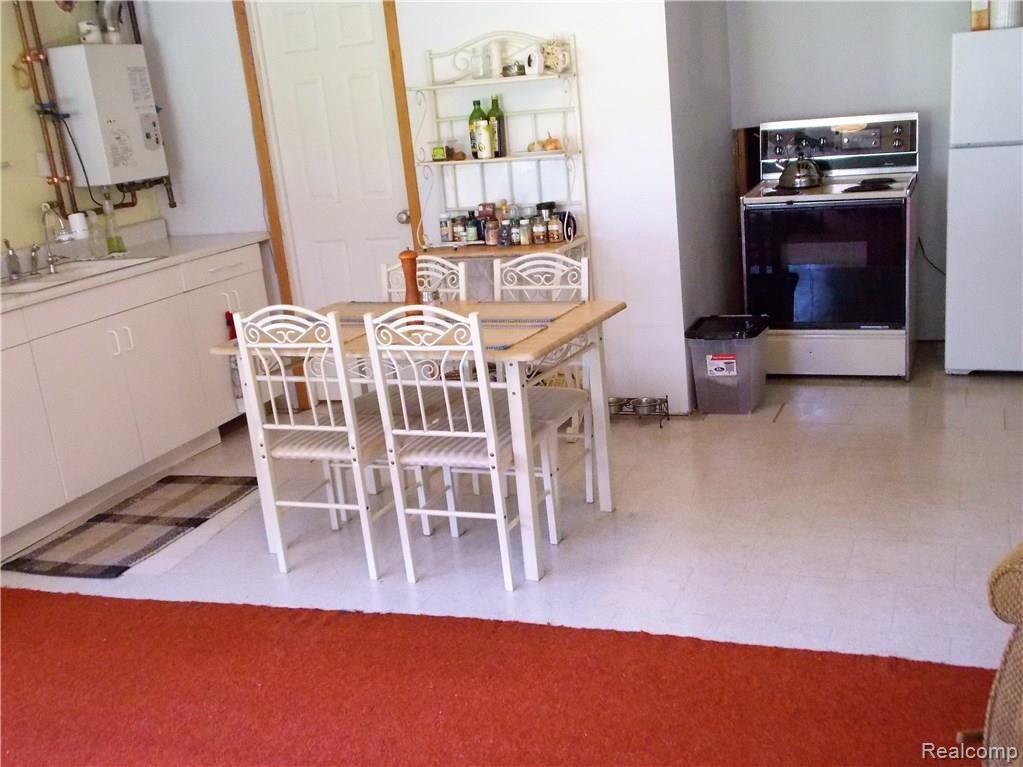 10221 Washburn Road Columbiaville, MI 48421 - Photo 22 of 37 This home also features a 2nd Kitchen in the partially finished basement. Entertaining large family gatherings will be simple, as long as you have a cook in both kitchens.