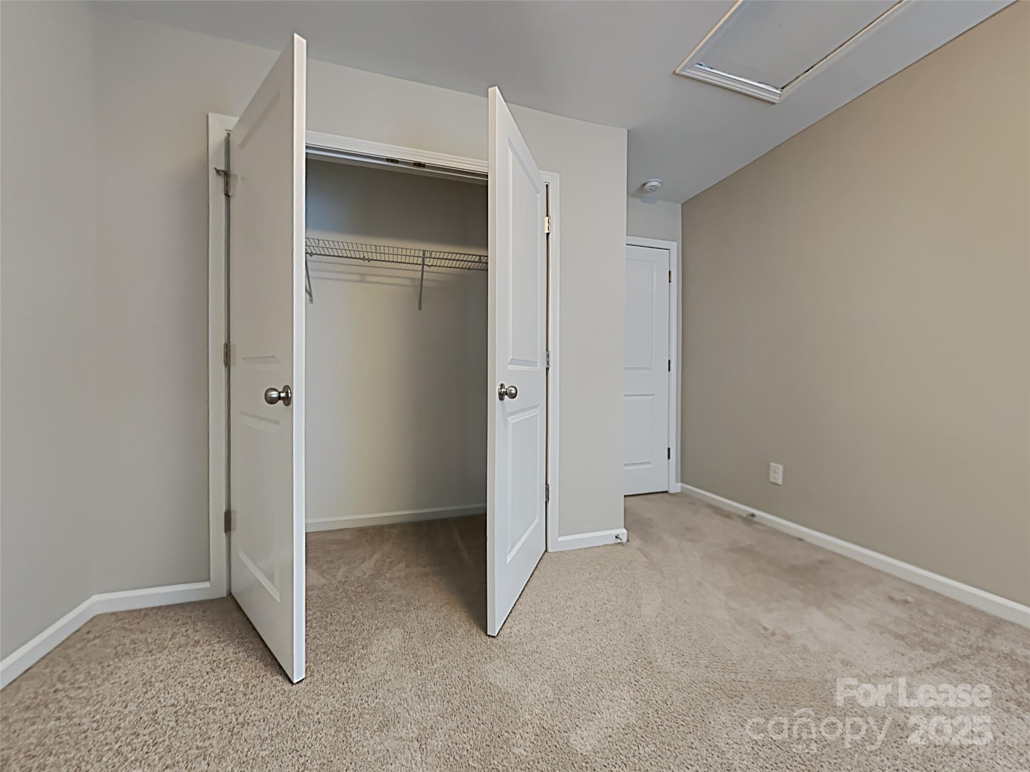 8188 Thornton Street Locust, NC 28097 - Photo 11 of 17 an empty room with closet