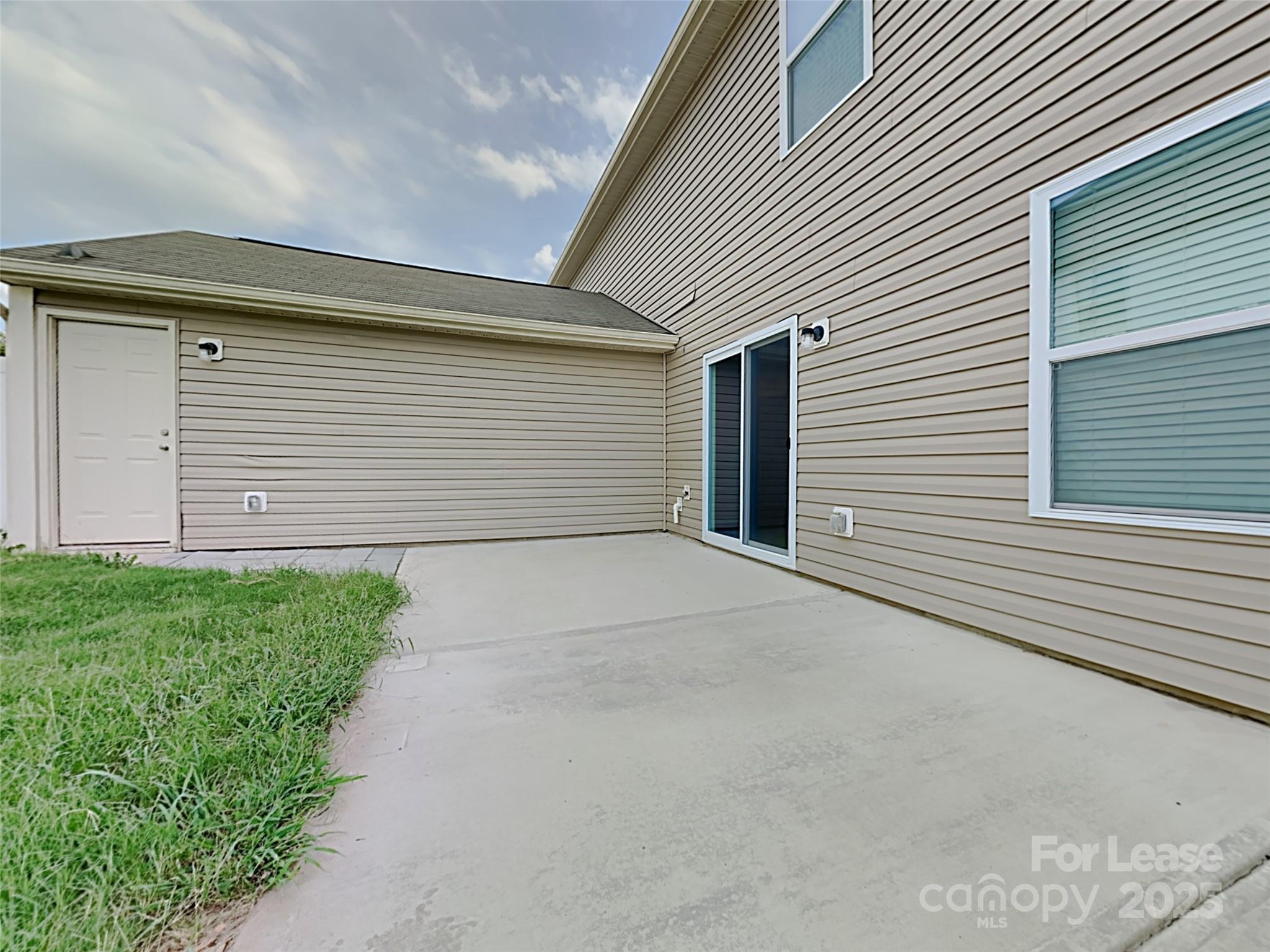 8188 Thornton Street Locust, NC 28097 - Photo 15 of 17 a view of outdoor space and yard