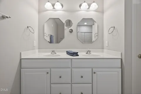 a bedroom with bed and window