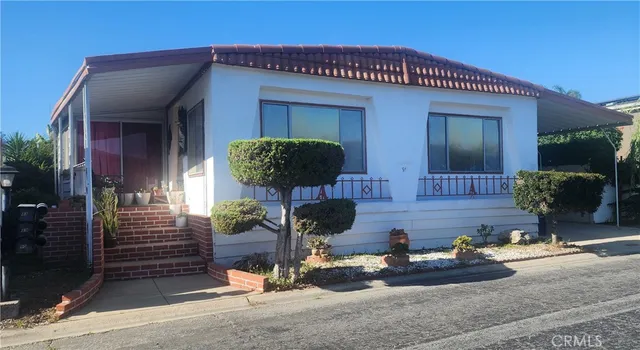a view of a house with sitting area