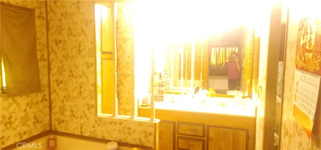 a view of a bathroom with a bathtub