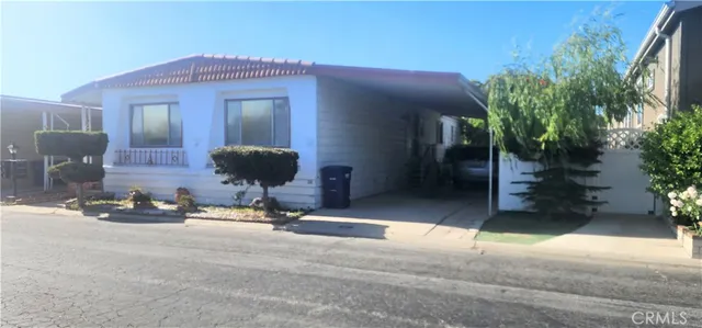 a house view with a garden space