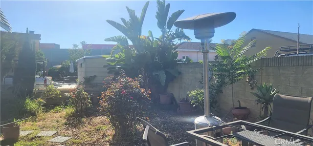 a front view of a house with sitting area
