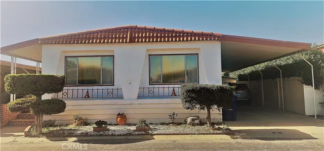 a view of a car garage and balcony