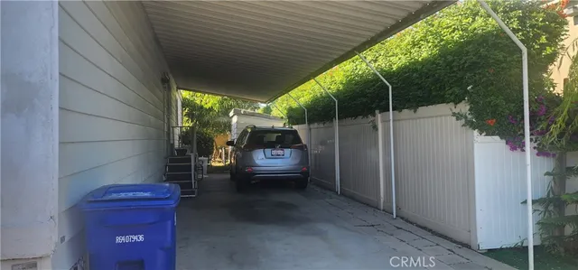 a view of balcony with furniture