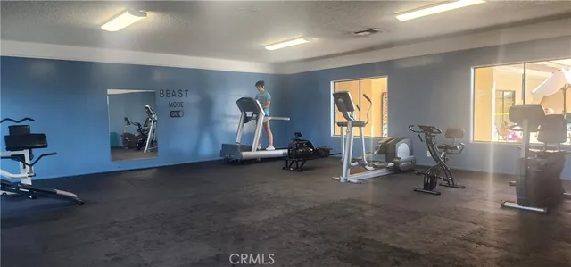 a view of a swimming pool with a yard