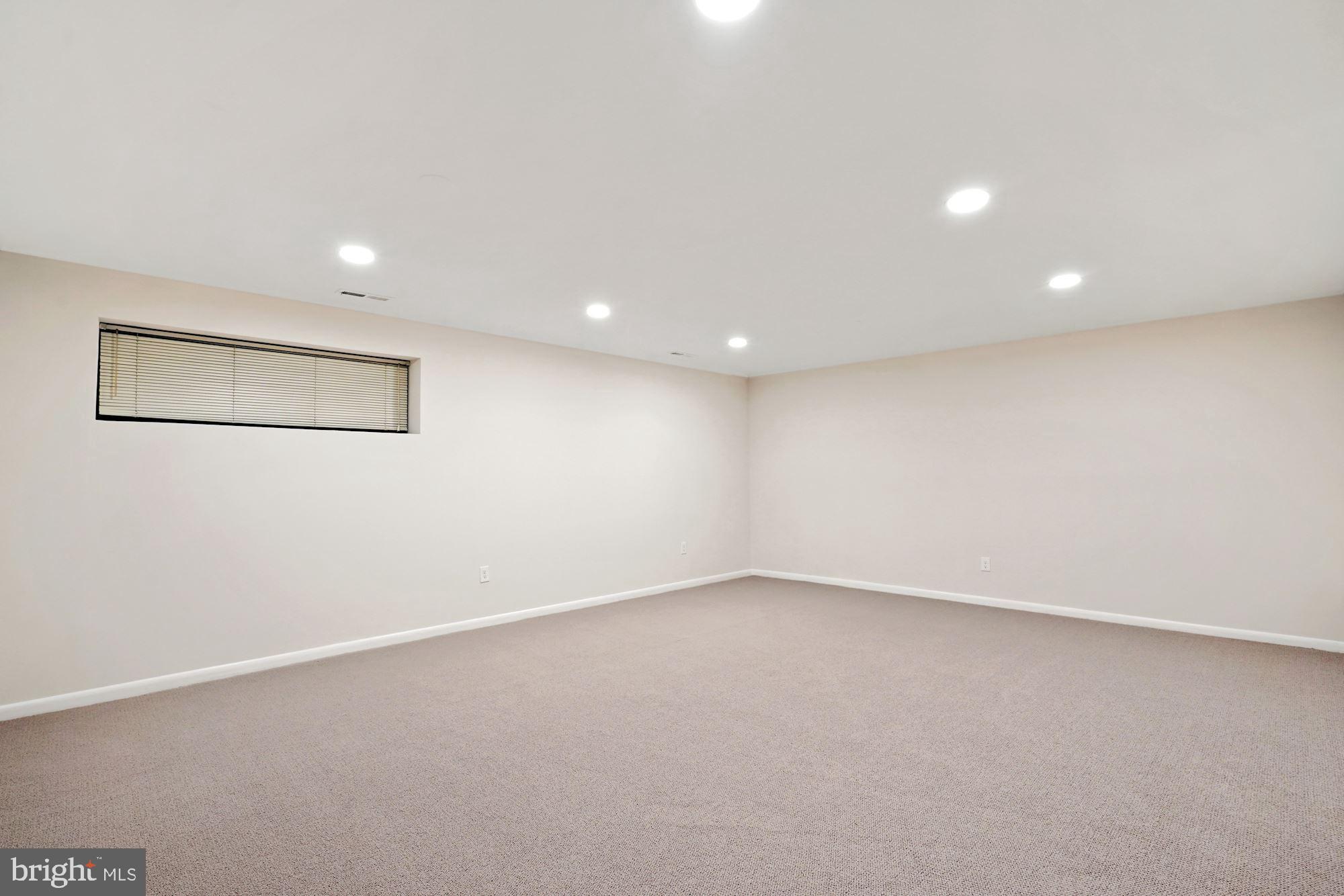 2005 Sarazen Place Reston, VA 20191 - Photo 28 of 35 Finished Family Room