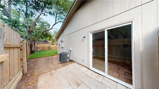 a view of a back yard from a room