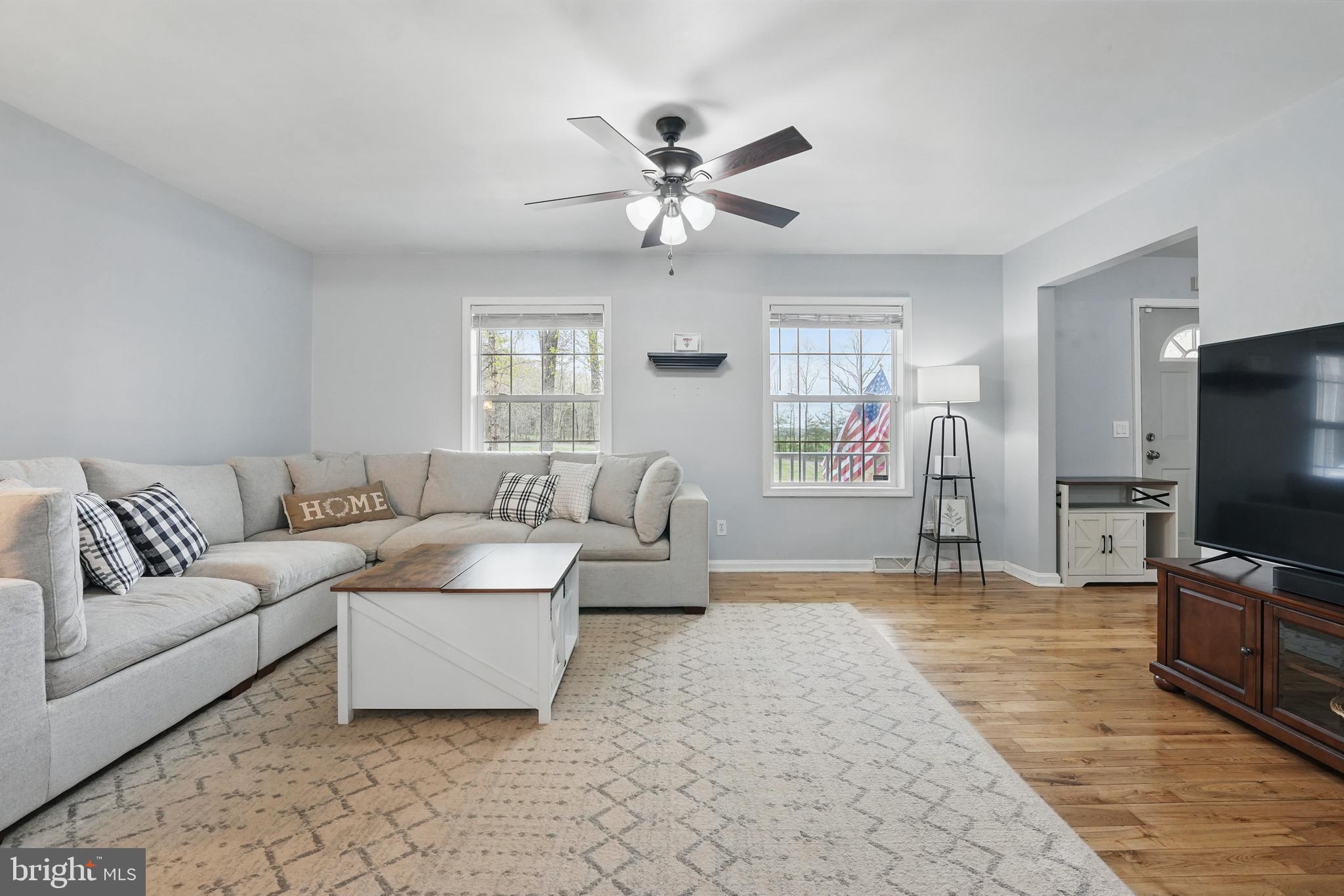 17307 Corder Road Elkwood, VA 22718 - Photo 4 of 20 a living room with furniture and a flat screen tv
