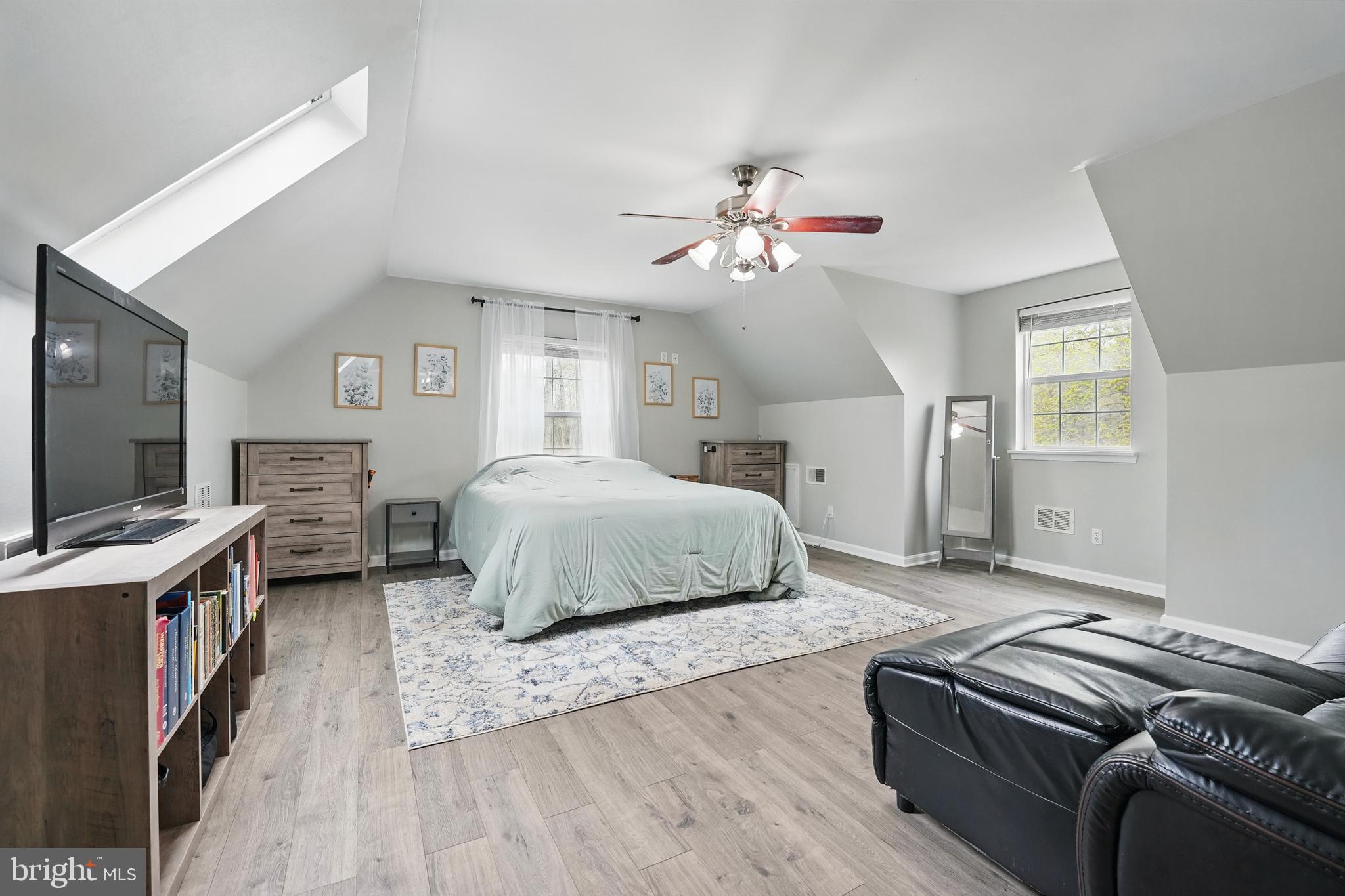 17307 Corder Road Elkwood, VA 22718 - Photo 5 of 20 a bedroom with a bed ceiling fan and a window