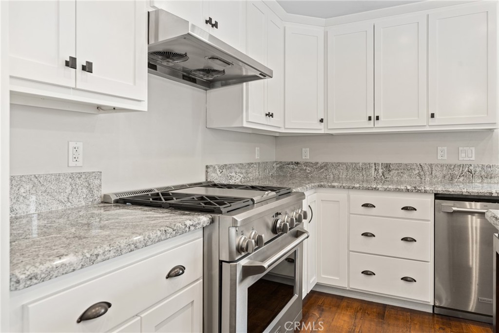 30300 Live Oak Canyon Road Redlands, CA 92373 - Photo 19 of 67 a stove top oven sitting inside of a kitchen
