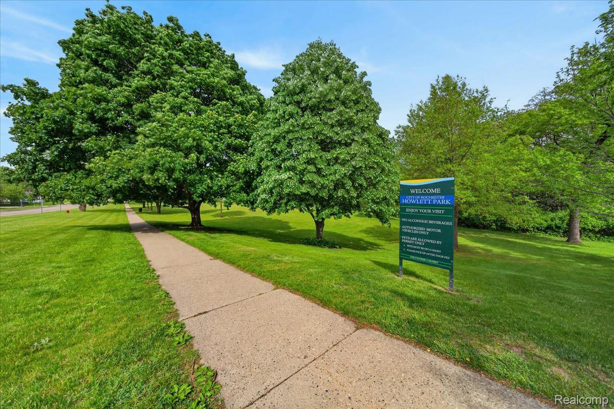 454 Romeo Road, Unit 226 Rochester, MI 48307 - Photo 21 of 26 View of home's community with view of wooded area