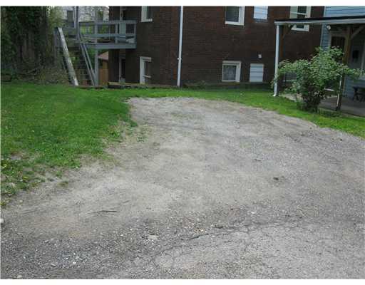 1323 Rutherford Avenue Beechview, PA 15216 - Photo 15 of 18 Exterior Front. Parking area