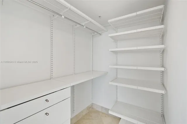 a hallway with white doors