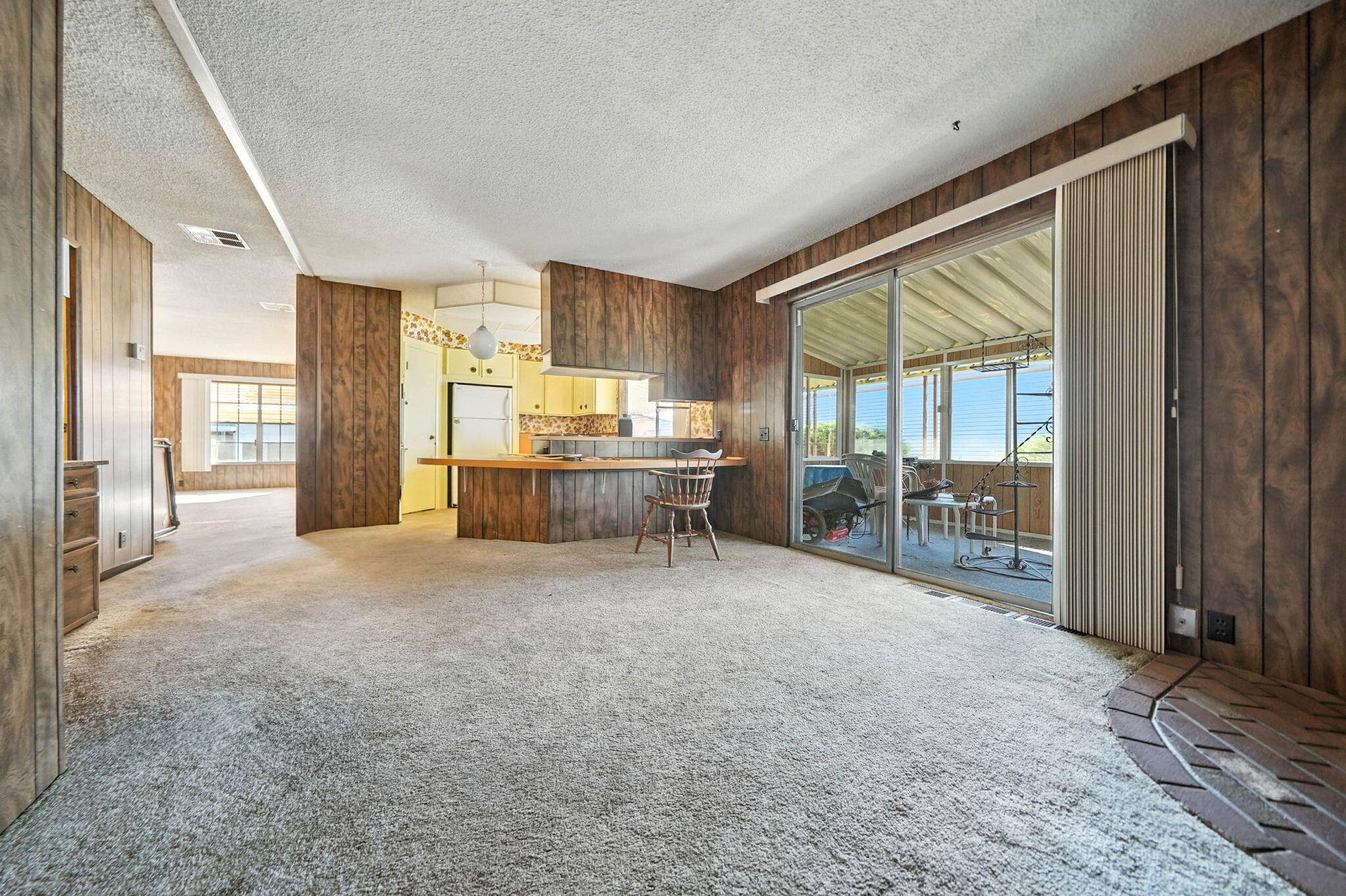 Undisclosed Address Redding, CA 96002 - Photo 13 of 34 a view of a kitchen with refrigerator and windows