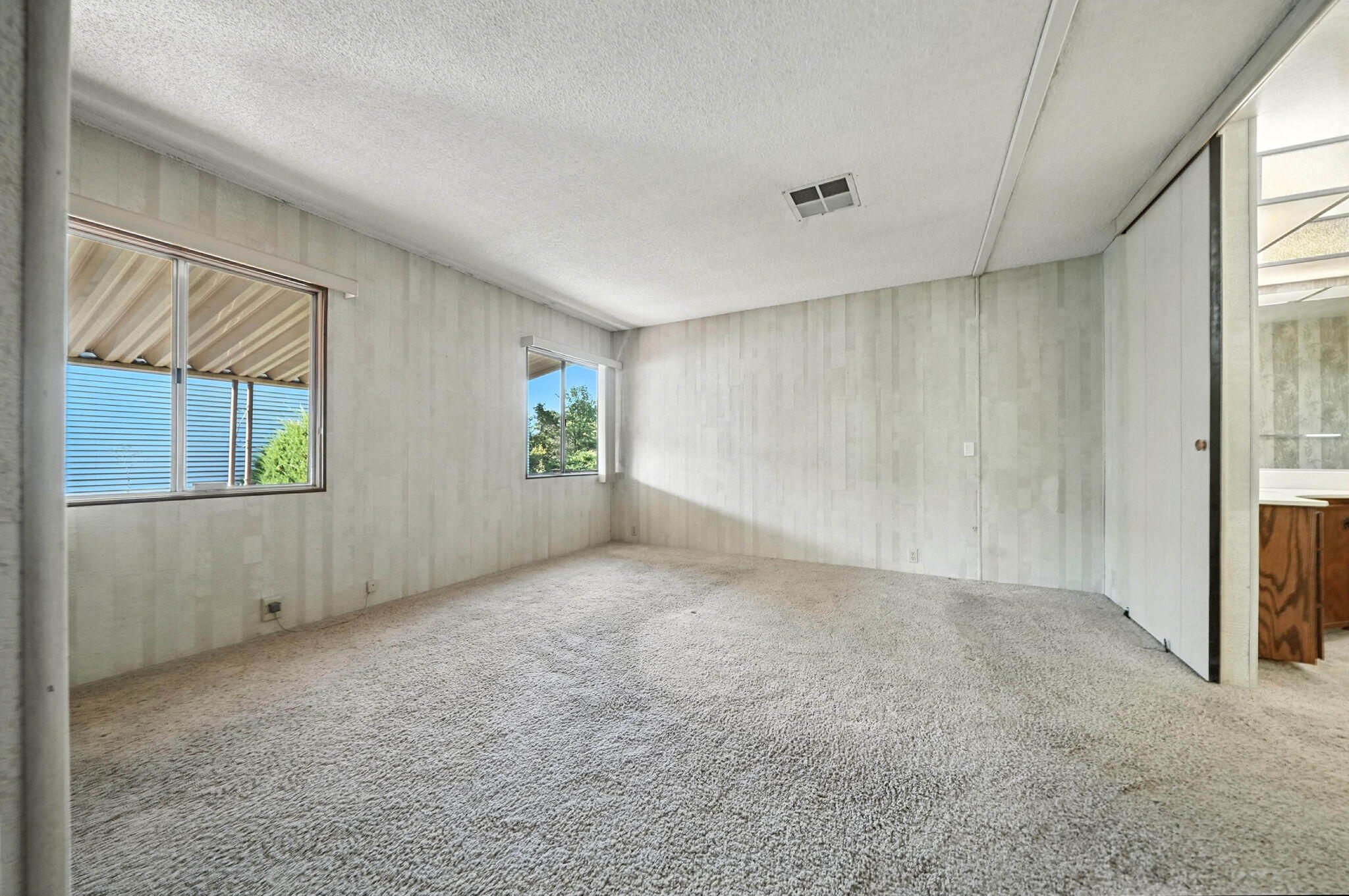 Undisclosed Address Redding, CA 96002 - Photo 14 of 34 a view of an empty room with a window
