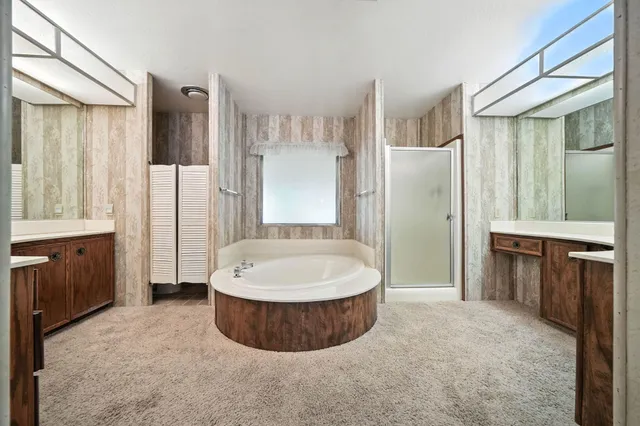 a white bath tub sitting in a bathroom