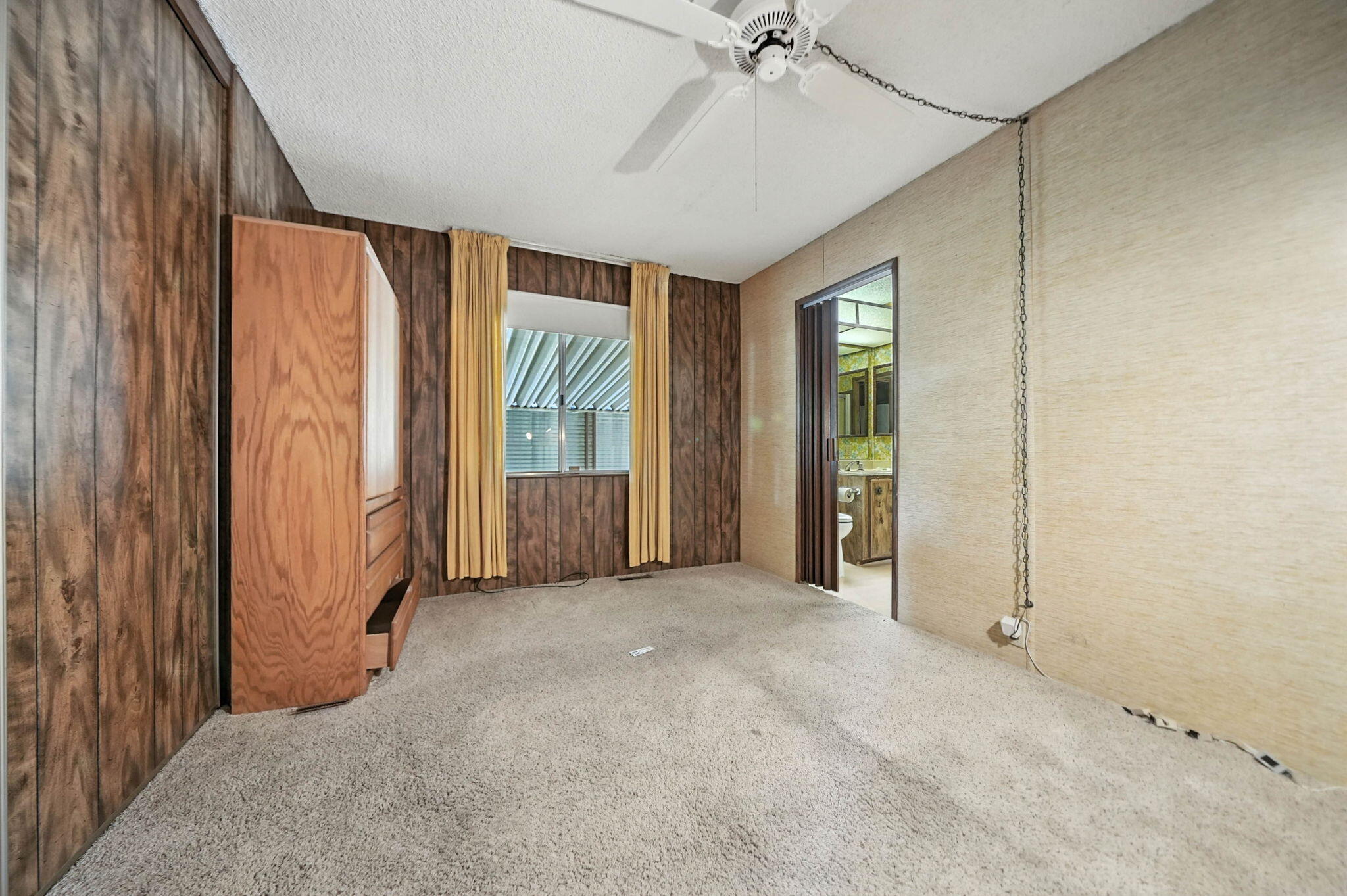 Undisclosed Address Redding, CA 96002 - Photo 20 of 34 an empty room with windows and fan