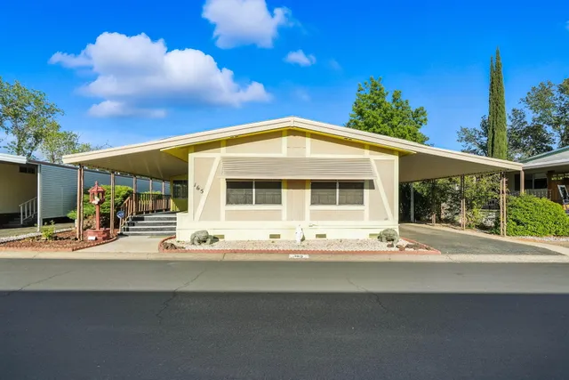a front view of a house with a view of the porch