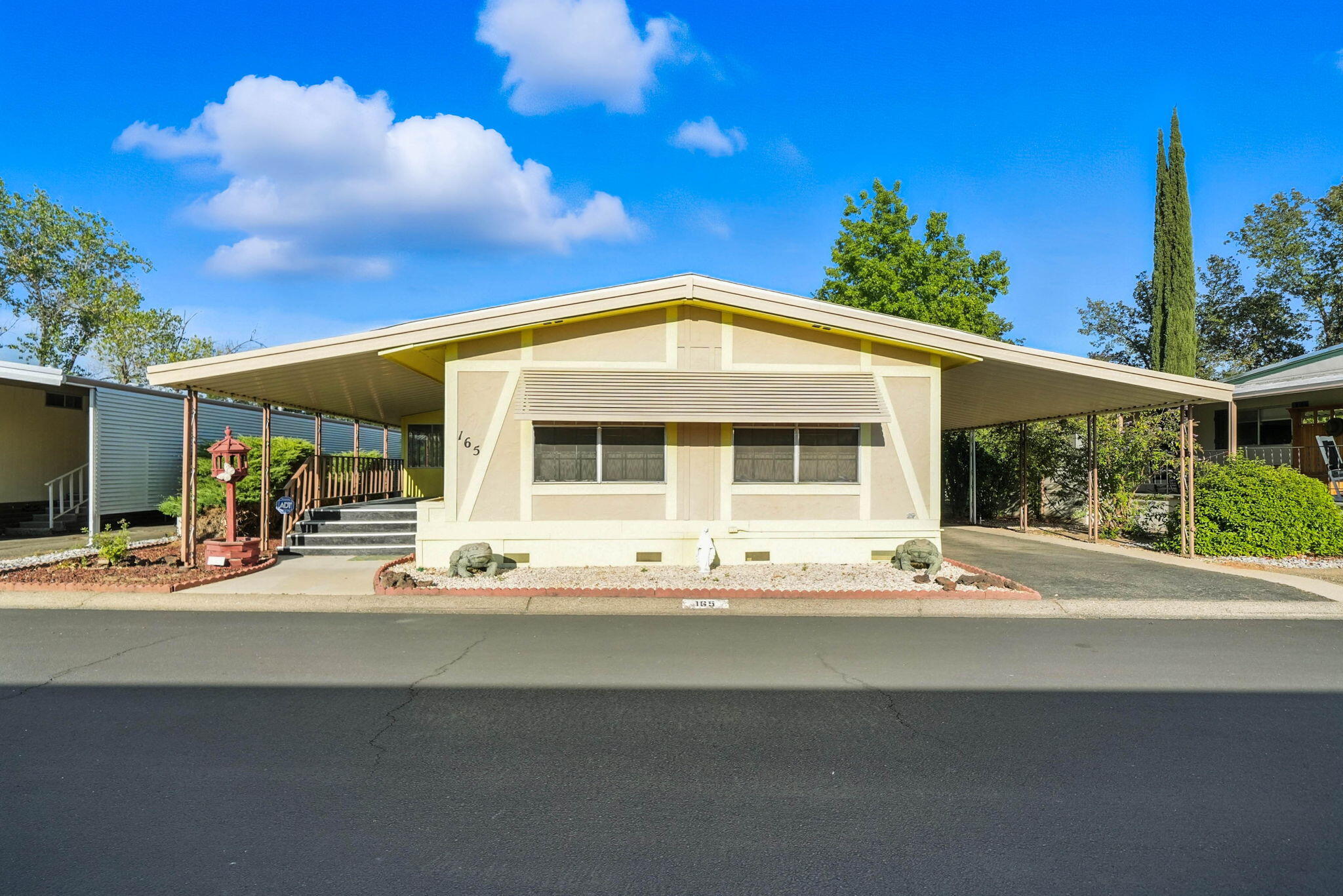 Undisclosed Address Redding, CA 96002 - Photo 2 of 34 a front view of a house with a view of the porch