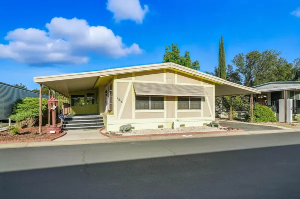 a front view of a house with a view of house