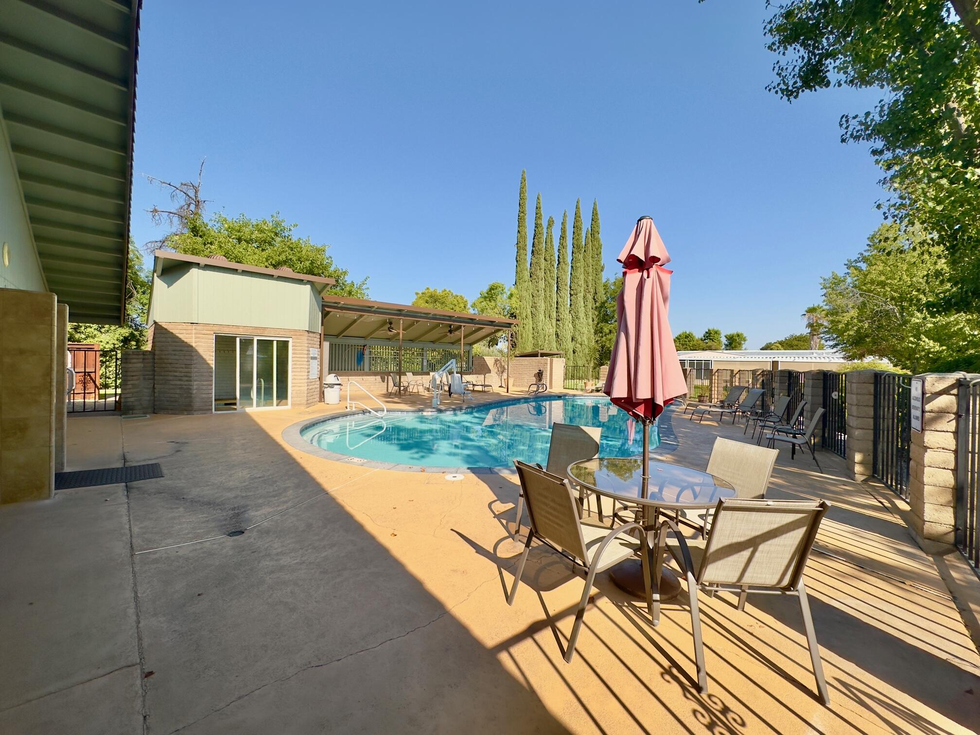 Undisclosed Address Redding, CA 96002 - Photo 32 of 34 a view of a patio with a table and chairs