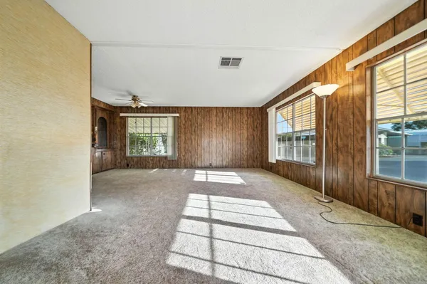 an empty room with windows