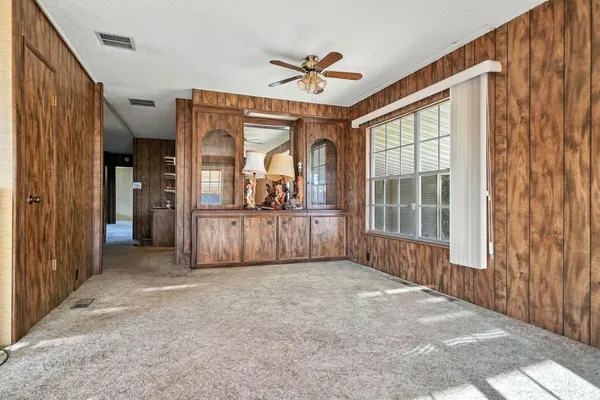 a kitchen with cabinets oven and a dishwasher
