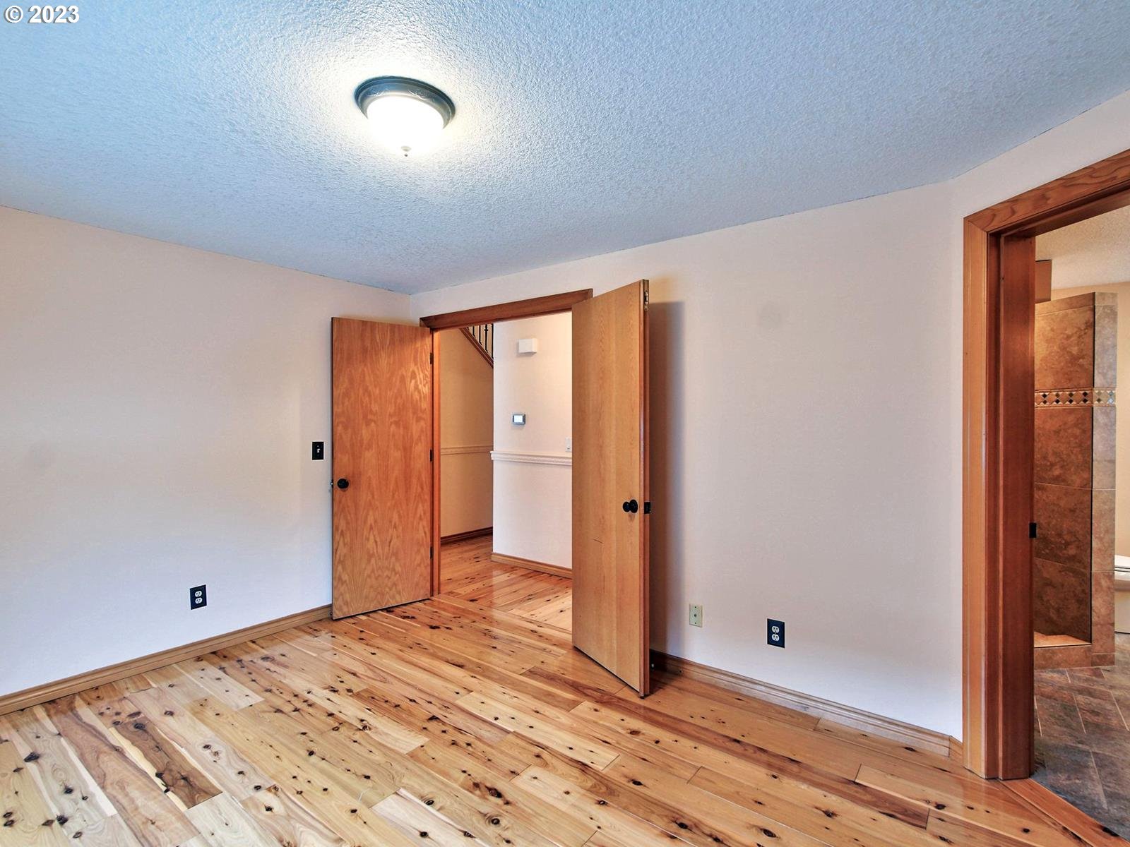 34385 Northeast Sunset Loop Scappoose, OR 97056 - Photo 16 of 42 a view of an empty room and window