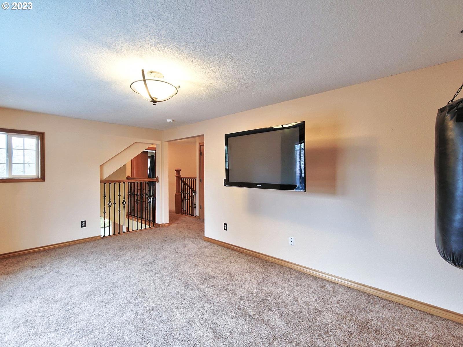 34385 Northeast Sunset Loop Scappoose, OR 97056 - Photo 24 of 42 a view of livingroom with hardwood floor and ceiling fan