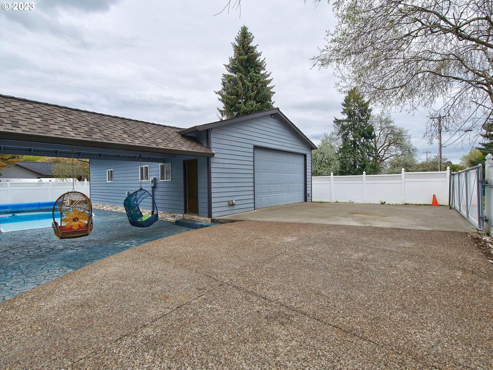 34385 Northeast Sunset Loop Scappoose, OR 97056 - Photo 37 of 42 a view of car parked in front of garage