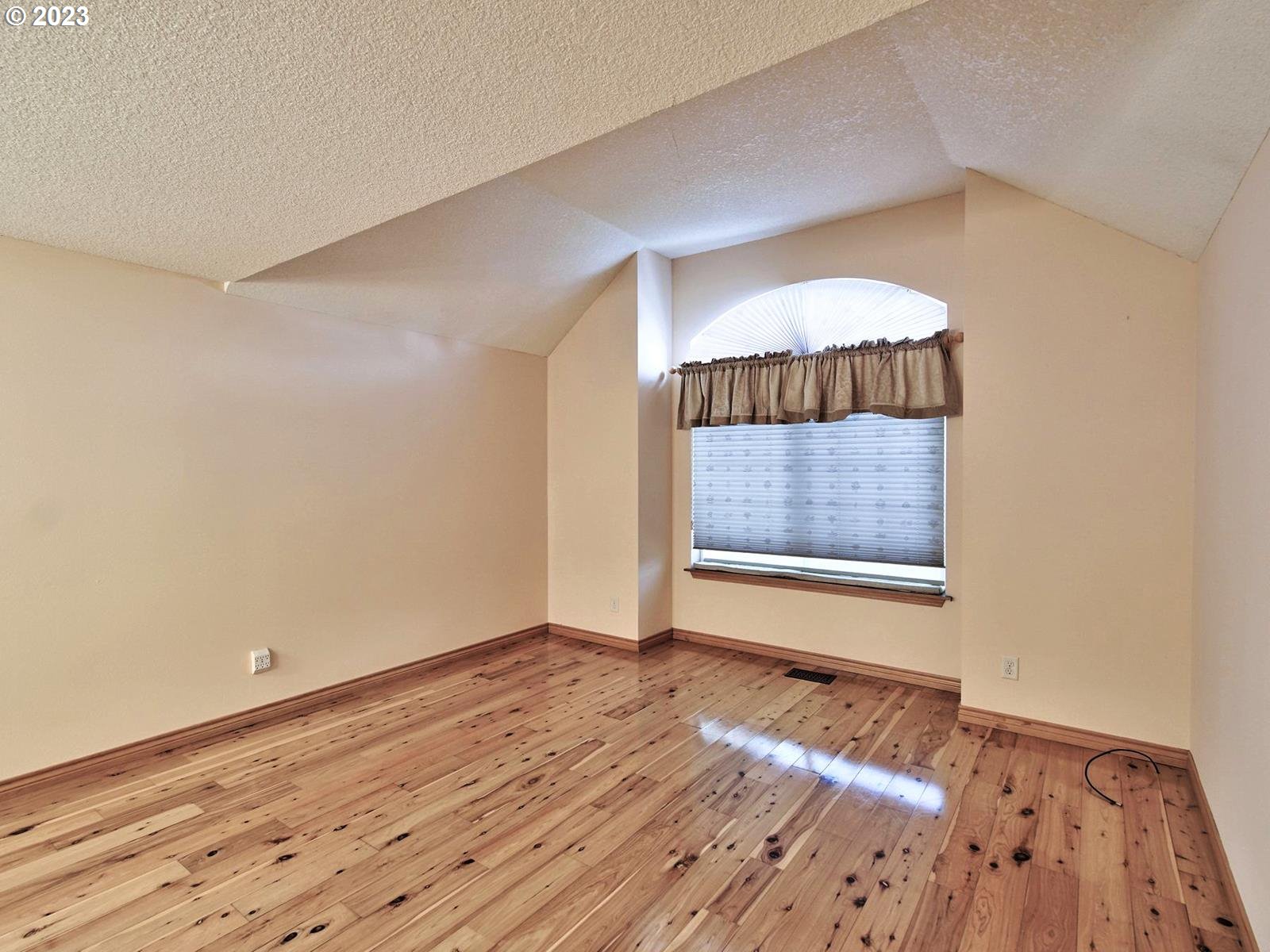 34385 Northeast Sunset Loop Scappoose, OR 97056 - Photo 6 of 42 a view of an empty room and window