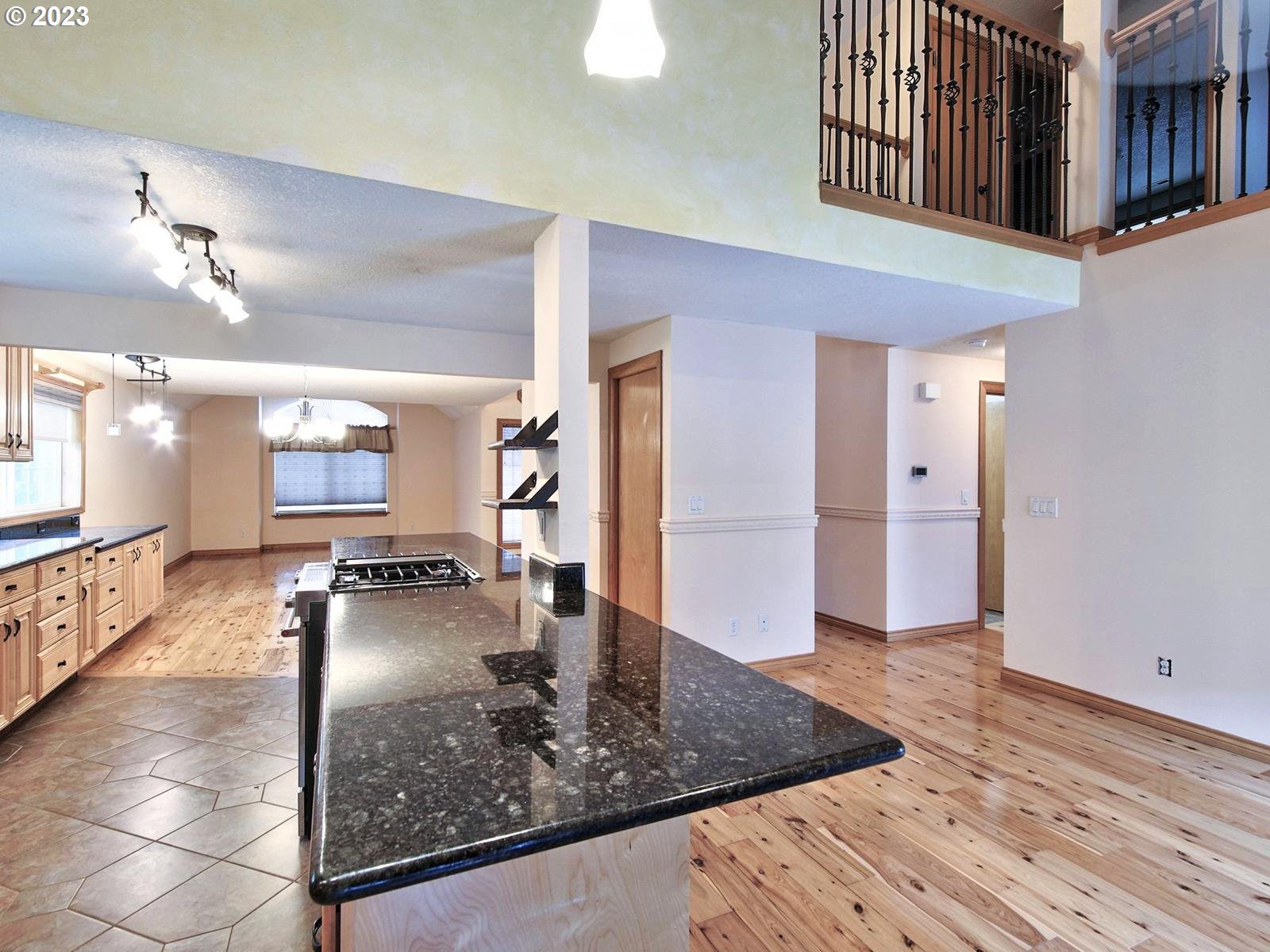34385 Northeast Sunset Loop Scappoose, OR 97056 - Photo 9 of 42 a view of a hallway with dining area