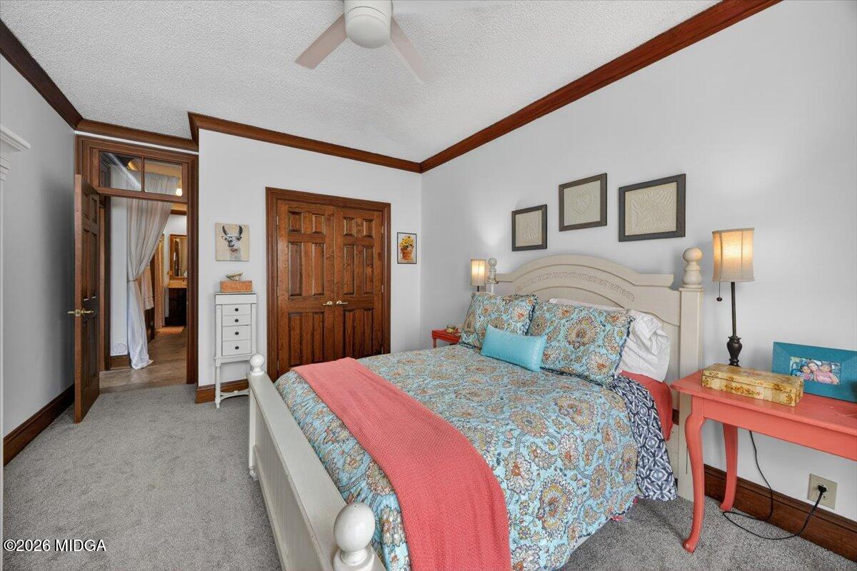 175 Corbin Avenue Macon, GA 31204 - Photo 21 of 21 a bedroom with a bed and a table