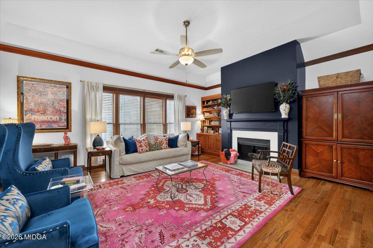 175 Corbin Avenue Macon, GA 31204 - Photo 7 of 21 a living room with furniture a fireplace and a table