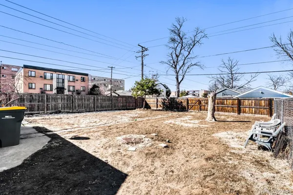 a view of a backyard of the house