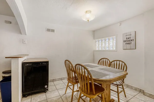 a view of a dining room with furniture