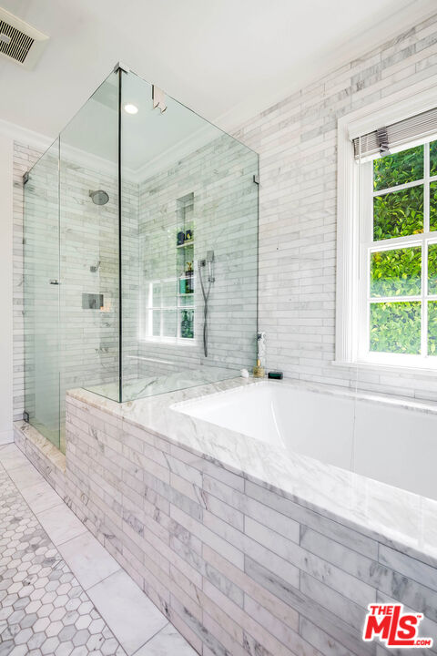 2755 McConnell Drive Los Angeles, CA 90064 - Photo 39 of 47 a bathroom with a tub and shower